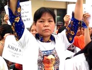 Mrs. Can Thi Theu at a peaceful demonstration on April 8, 2016