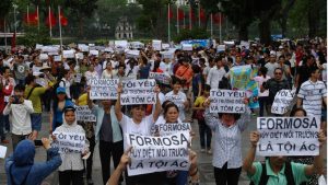 Environmentalists hold peaceful demonstration to demand Vietnam's government to carefully investigate the massive death of marine species in the central coast